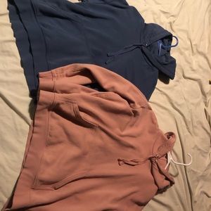 Two never worn sweatshirts in blue and salmon pink